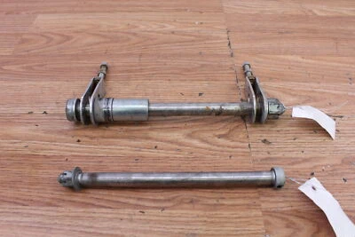 1983 SUZUKI GS450L Front and Rear Axle w/ Adjusters and Spacers - Image 1 of 4