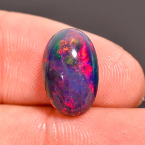Cabinas de ópalo etíope negro natural de 3,1 quilates con forma ovalada piedras preciosas sueltas 13X8X6 mm - Imagen 1 de 5