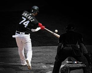 Eloy Jimenez Chicago White Sox Unsigned Hitting in Black Jersey Photo - Picture 1 of 1