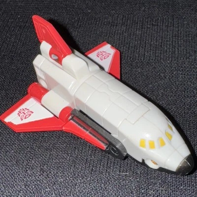 "Figura Hasbro Transformers Universe Micro Aerialbots Storm White & Red Jet 2,25""" Foto 1 de 4