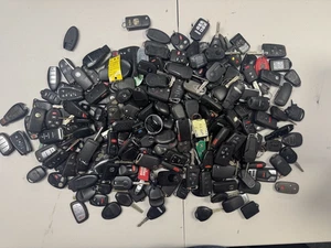 LARGE LOT OF KEY FOBS OEM AND AFTERMARKET LOT UNTESTED LARGE BOX FILLED - 1630 - Picture 1 of 4