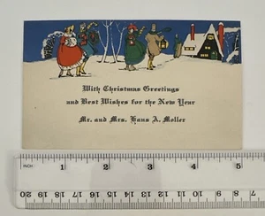 Tarjeta de Navidad Art Deco Vintage - Pareja caminando con regalos en la nieve - Imagen 1 de 3