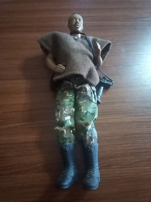 Figura Mattel Inc en poncho de arpillera con cámara Foto 1 de 4