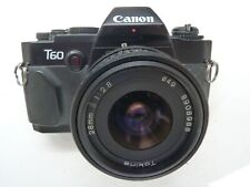 Canon T60 SLR Camera,TOKINA 28/2.8 lens .READ