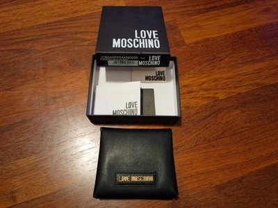 Cartera a presión Love Moschino pequeña de cuero negra con caja y etiquetas originales Foto 1 de 4
