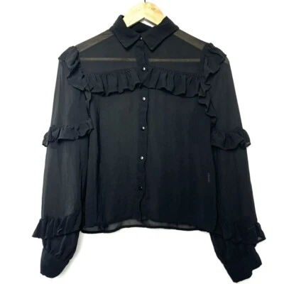 Blusa Forever 21 contemporánea negra transparente con botones, manga larga, detalle de volantes Foto 1 de 4