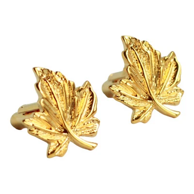 Gemelos de hoja de color dorado Foto 1 de 3