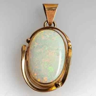 Colgante solitario de ópalo de fuego natural de corte ovalado de 4 quilates enchapado en oro amarillo de 14 quilates en plata Foto 1 de 4