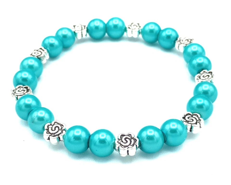 Pulsera elástica de perlas turquesas de vidrio y plata tibetana con flores para mujer BOHO Foto 1 de 1