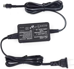 AC-L200 Caricabatteria adattatore di alimentazione CA per videocamera Sony Handycam DCR-SX,DCR-SR,DC... - Foto 1 di 9