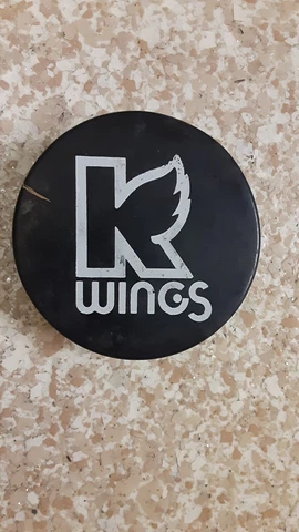 Early to mid 1980's Kalamazoo Wings (IHL) official game used puck #2 Cover
