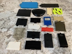 Lot of 19 Vintage Battery Covers Lids from Toys / Games Toy Collectors Must See! - Picture 1 of 5