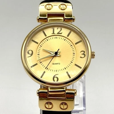 Reloj para mujer Gossip 34 mm esfera tono dorado y caja con correa de cuero negro GSP947 Foto 1 de 4