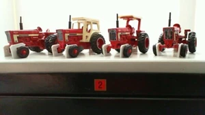 Ertl International Traktoren Maßstab 1:64 I H C "66" Serie - Bild 1 von 7