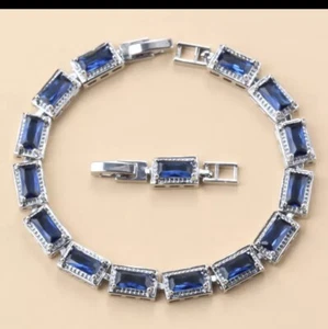 Sterling Silver Blue Lab-Created Sapphire and White Topaz Tennis Bracelet - Picture 1 of 8