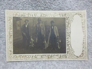 1907 MeN HUNTING RABBITS  Unusual BORDER RPPC Photo POSTCARD Shotguns & Suits - Picture 1 of 2