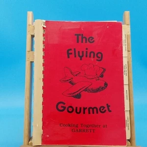 Vintage The flying gourmet cooking together with Garrett 1985 recipe Book. - Imagen 1 de 7