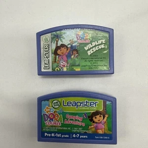 Leapster LeapFrog Lot of 2 Dora The Explorer Wildlife Rescue Camping Adventure - Picture 1 of 1