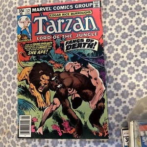 Edgar Rice Burroughs : Tarzan #12 Fangs of Death 1978 Marvel Comic NMC - Picture 1 of 4