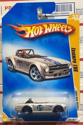 2009 HOT WHEELS TRIUMPH TR6, 2009 NEW MODELS #33/42, SILVER, #033/190, BLUE RIMS - Image 1 of 4