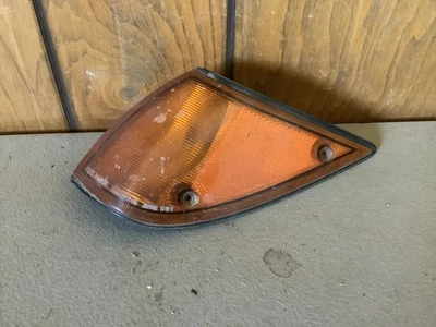 Isuzu I-Mark 212-21410 1987 luz de señal de giro de esquina del lado del conductor ((R1-160)) Foto 1 de 4