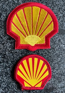 JUEGO DE DOS PARCHES DE CARRERAS DE TELA DE ACEITE SHELL NOS - Imagen 1 de 5