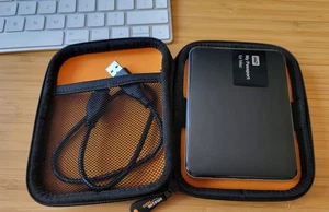 WD My Passport for Mac 2TB External hard drive low hours - Photo 1/1