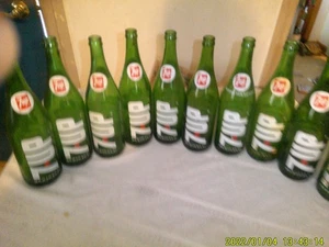 COLLECTION OF 10 MATCHING GREEN GLASS 28 OZ VINTAGE 7-UP BOTTLES - Picture 1 of 11