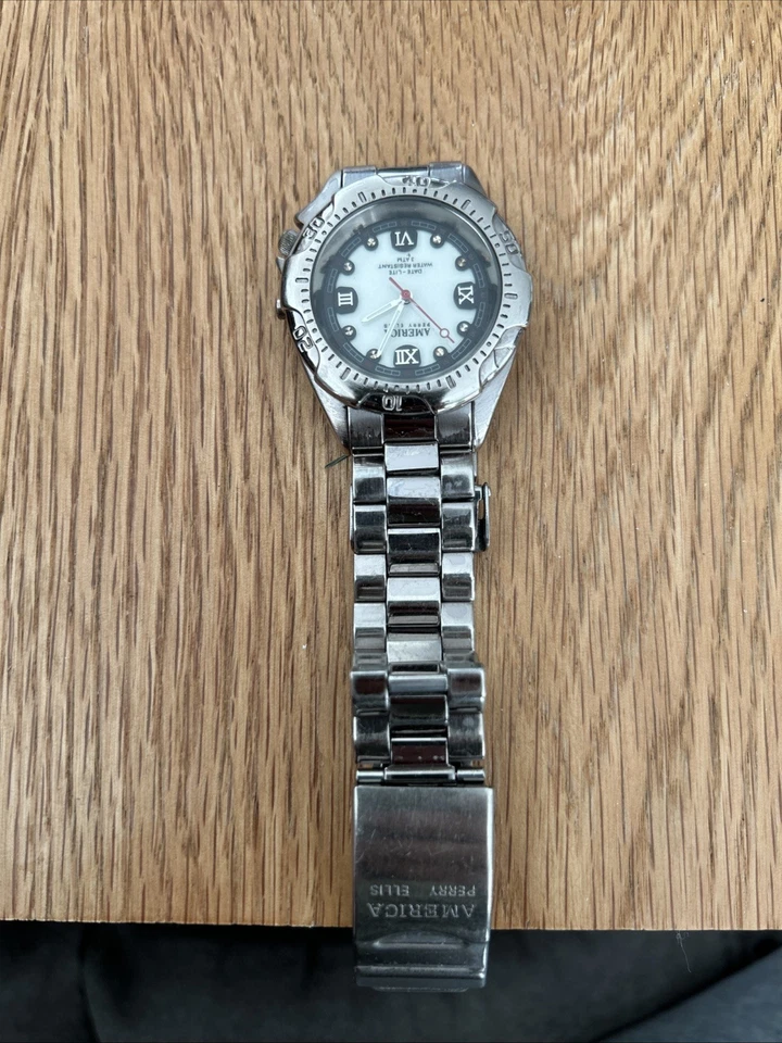 AMERICA BY PERRY ELLIS Mens Watch Blue Dial Gold/Silver 6-3/4” Stainless Band 3P - Image 1 of 4