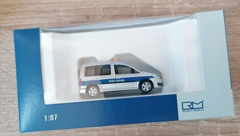 Rietze 52915 - 1/87 Volkswagen Caddy ´11 Aeroporto Security Düsseldorf - Nuovo - Immagine 1 di 1