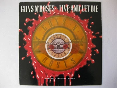 GUNS N' ROSES - LIVE & LET DIE. UK 1991 TRANSLUCENT ORANGE 12" SINGLE. LOOKS EX. - Image 1 of 4