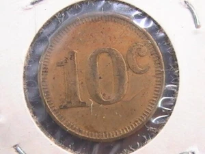 TOKEN MERCHANISE 10 centavos token de latón de EE. UU. - Imagen 1 de 2