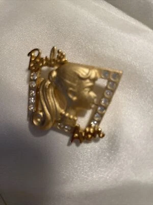 Broche Barbie coleccionable para AVON por Mattel tono dorado y estrás Foto 1 de 2