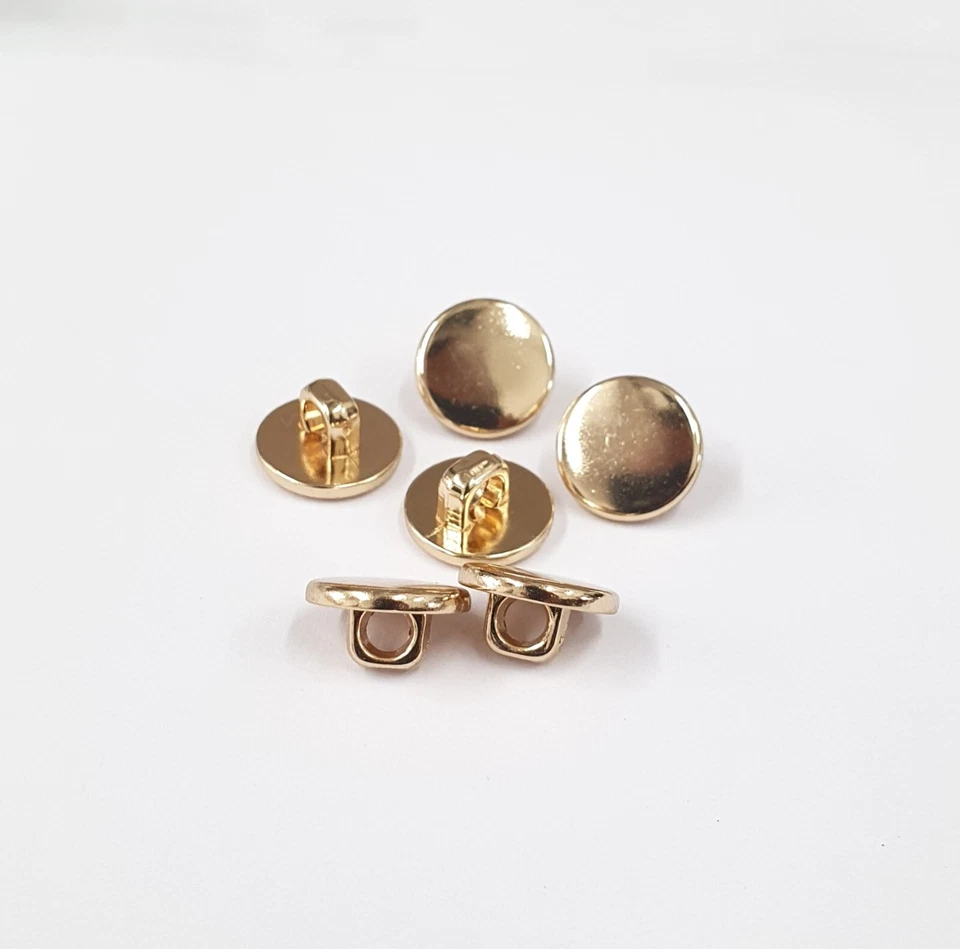 ACRYLIC/ABS FLAT GOLD SHANK BUTTONS SIZES 11.4MM/17.8MM/20.4MM/25.4MM - Image 1 of 1