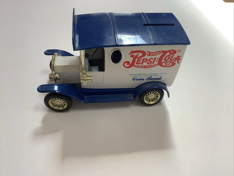 Banco de monedas Pepsi-Cola azul y blanco Foto 1 de 3