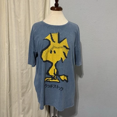 Camiseta con licencia Peanuts de Zara azul Woodstock gráficos delanteros y traseros talla M Foto 1 de 4