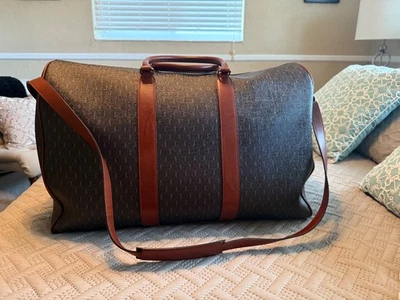 Bolsa de viaje Saint Laurent Le Monogramme 72h en lona Cassandre con ribete de cuero Foto 1 de 4