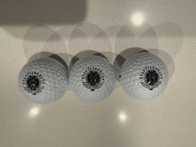 Pelotas de golf Wilson autenticadas en cubierta superior autografiadas por Michael Jordan (3) Foto 1 de 4