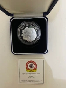 UGANDA: Moneta Commemorativa 40 Anni di Indipendenza 20.000 Scellini ORIGINALE - Foto 1 di 3