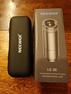 Lente súper teleobjetivo Neewer 7x HD para teléfono inteligente 17 mm Foto 1 de 4