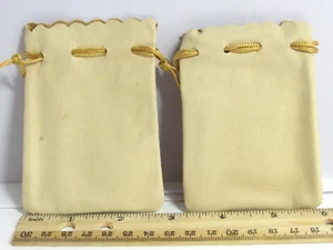 "JUEGO DE 2 GUANTES GENUINOS CUERO SUAVE BOLSA DE CUERDA BEIGE 2 3/4"" X 3 3/4" - Imagen 1 de 2