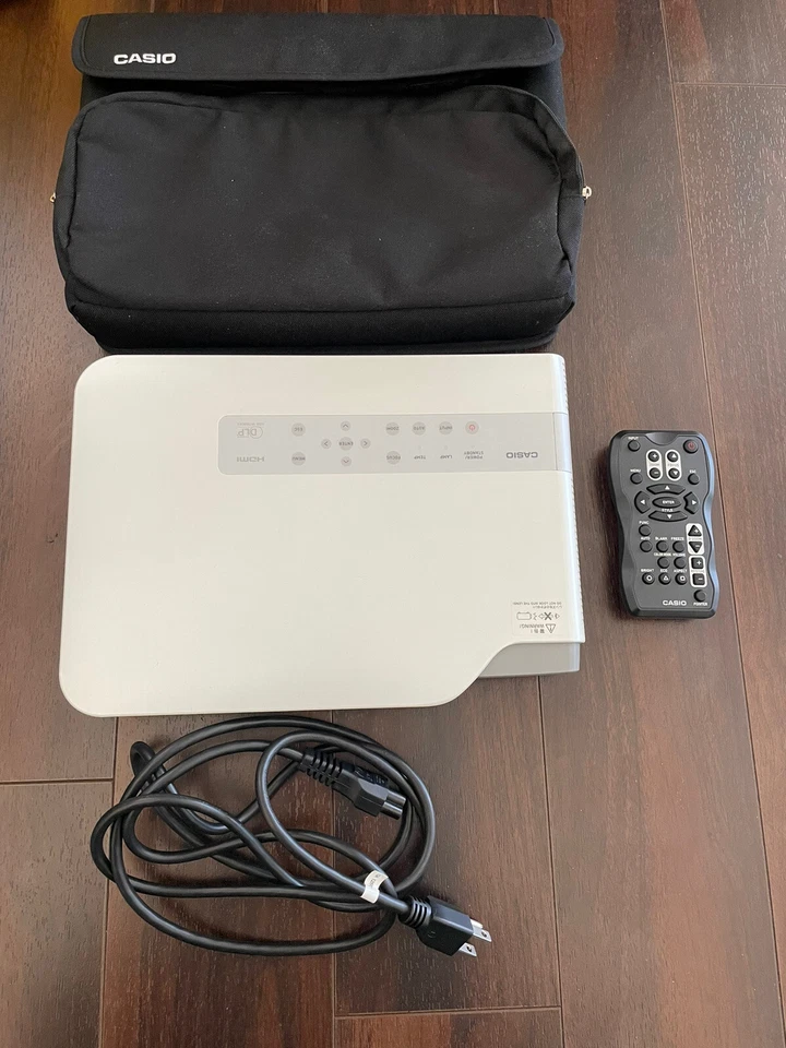 CASIO MODEL XJ-A240 ULTRA PORTABLE LED HD 720p W/ BAG AND REMOTE CONTROL - Image 1 of 4