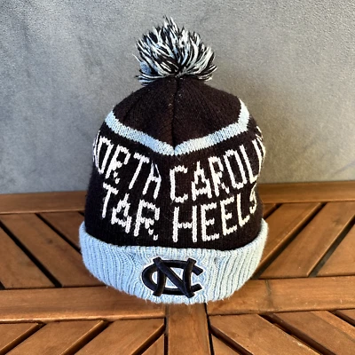North Carolina Tarheels Beanie Pom Winter Cuff Knit Hat Spellout Logo Blue Retro - Image 1 of 4