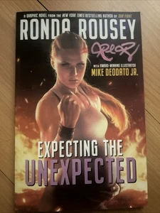 SIGNIERT RONDA ROUSEY erwartet das Unerwartete AWA Softcover Buch Deodato Kunst - Bild 1 von 3
