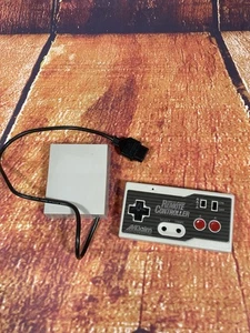 Sistema de entretenimiento Nintendo Aklaim mando a distancia inalámbrico por infrarrojos PARA REPUESTOS - Imagen 1 de 10