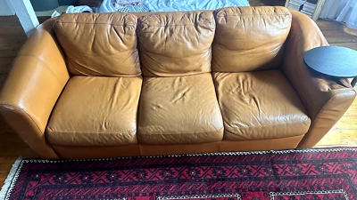 Brown/ Orange Leather Couch for Sale. Few scratches and dent - Image 1 of 2