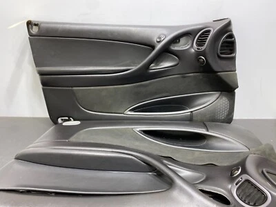 2005 PONTIAC GTO OEM BLACK FRONT DOOR PANEL PAIR DR PS BLACK SUEDE INSERT USED - Image 1 of 4