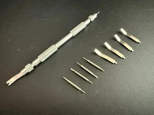 Neu Uhrenarmband Federsteg Link Remover Reparaturwerkzeug Metallgehäuse mit 8 zusätzlichen Stiften - Bild 1 von 4