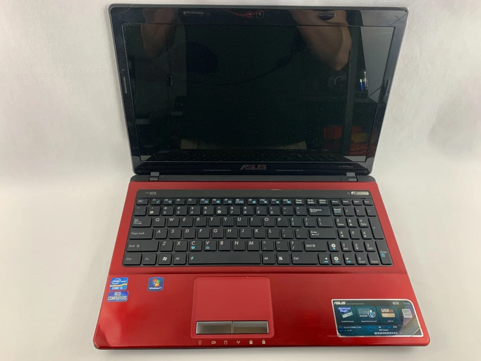 Portátil Asus K53E rojo para piezas o reparaciones, enciende, pantalla agrietada, sin disco duro Foto 1 de 4