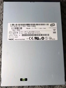 FD1231M NEC internes Diskettenlaufwerk - schwarze Blende - Bild 1 von 2